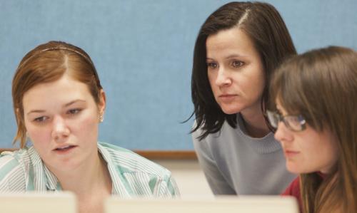 Group of researchers examine results.