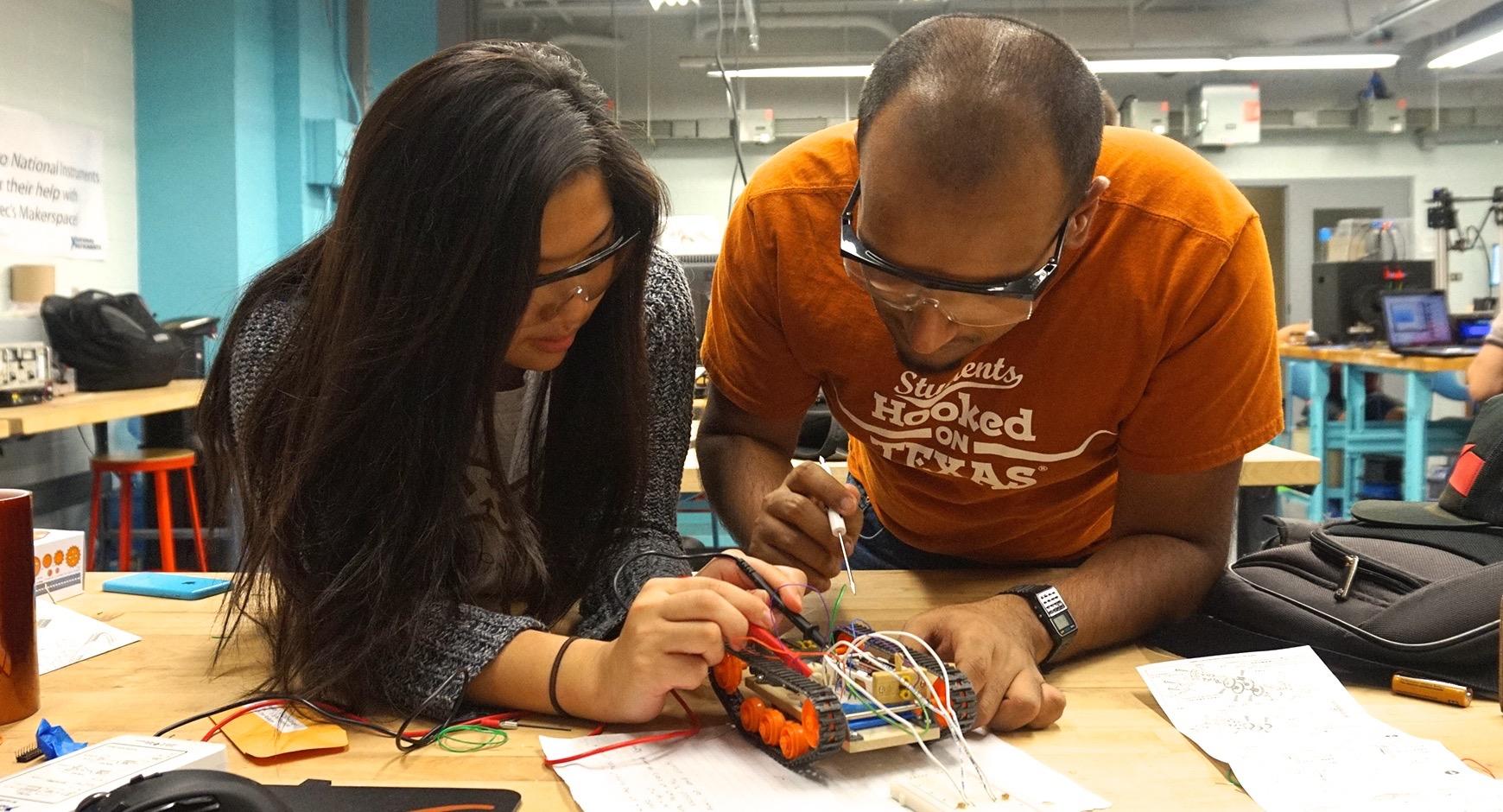 Students tinker with a project in Longhorn Maker Studio.