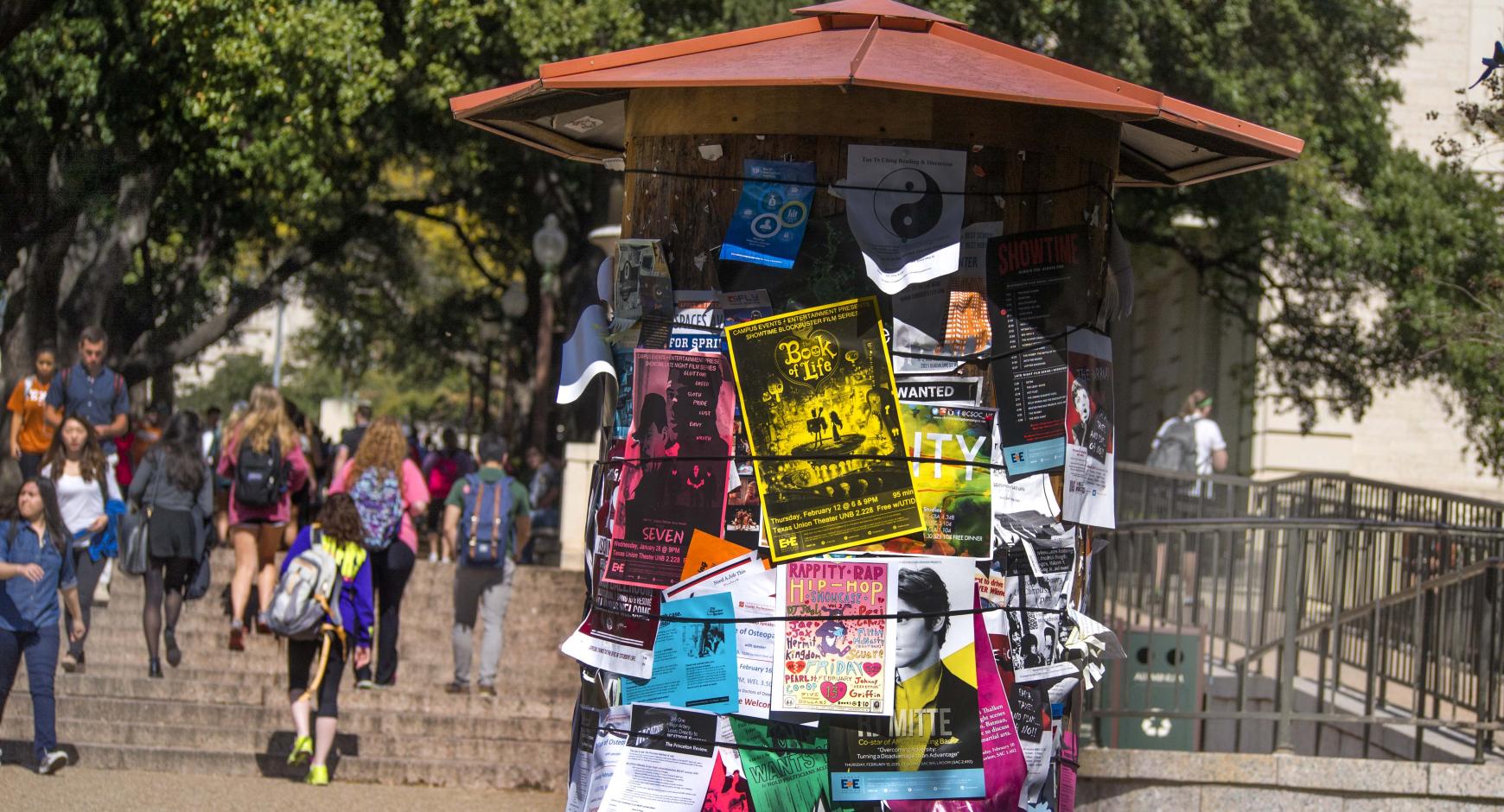 Kiosk with event flyers on the West Mall.